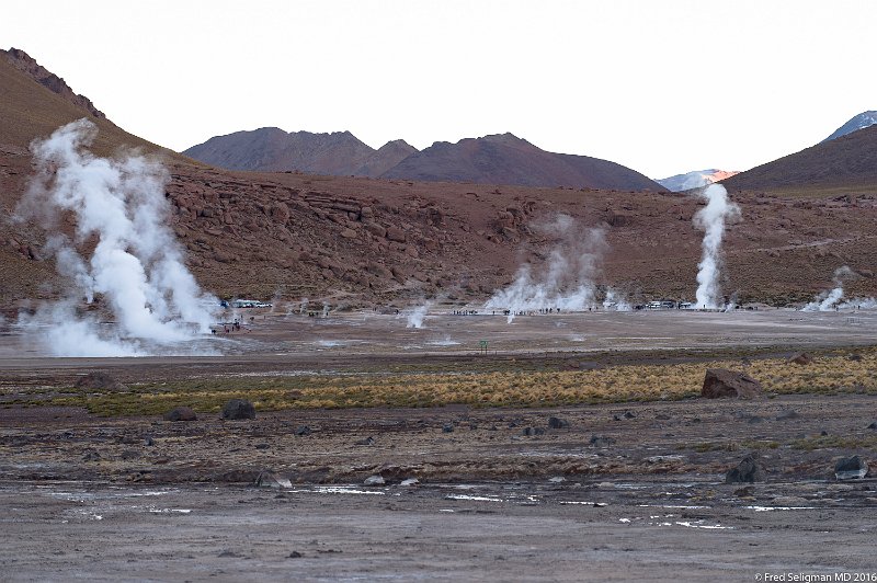 20160331_074521 D4S.jpg - The hot subterranean water builds up pressure through cracks in the earth's crust.   The boiing  water reaches temperstures of about 185 degrees (the boiling point at this altitude).  The steam vents called fumaroles are the result of the contrast with the cold ambient air, and can reach heights of up to 30 feet